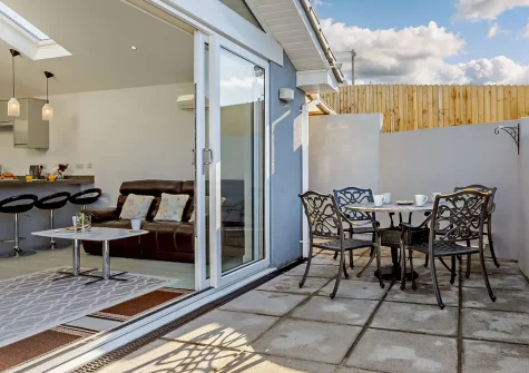 The patio & alfresco dining area at Bay View, Brixham Holiday Park, Brixham