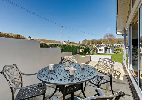 The patio & alfresco dining area at Bay View, Brixham Holiday Park, Brixham
