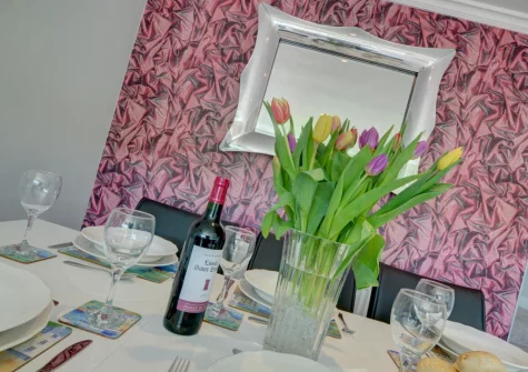 The dining area at Bay View Bungalow, Combe Martin
