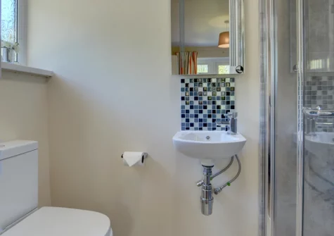 Bedroom #1 en-suite shower room at Bay View Bungalow, Combe Martin