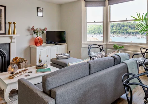 Bayards View, Dartmouth is a stunning three-bedroom duplex apartment boasting unrivalled panoramic views across the River Dart, with beautifully presented interiors, a prime waterside location, and the town's galleries and restaurants moments away.