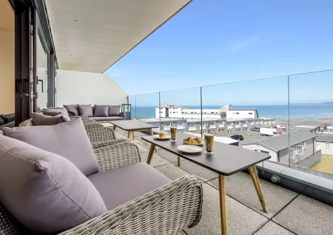 The balcony & outdoor sitting area at Baywatch, Westward Ho!