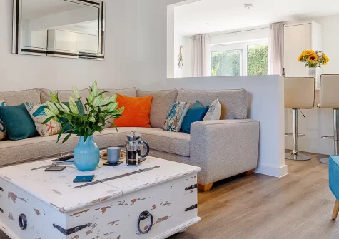 Beach Ahoy! Instow is a stylish 3-bedroom coastal retreat with a hot tub. Boasting an enclosed garden, it's ideally located near Instow's estuary beach and the famous Tarka Trail. Near the village centre, it offers easy access to local attractions.