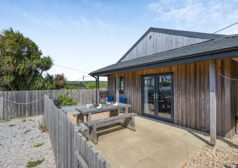 The enclosed patio, barbecue & alfresco dining area at Beach Combers, Widemouth Bay