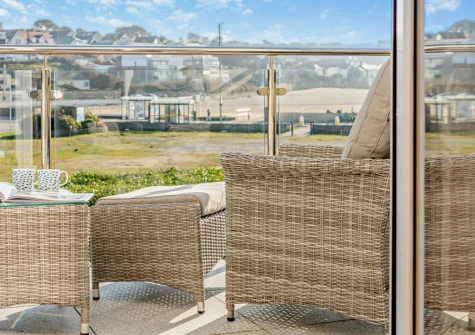 The sea-facing balcony & outdoor sitting area at Beach Haven, Newquay