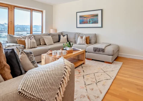 Beach Haven, Newquay is a stunning three-storey coastal home with four bedrooms, private hot tub and games room. Enjoy magnificent sea views, family fun, and the beach just a stone's throw away—perfect for creating unforgettable memories.