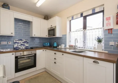 The kitchen at Beach Retreat, Pennasville, Holywell