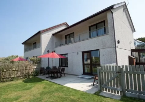 The patio, alfresco dining area & garden at Beach Retreat, Pennasville, Holywell
