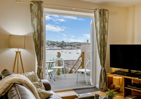 From the living room step out on to the balcony & outdoor sitting area