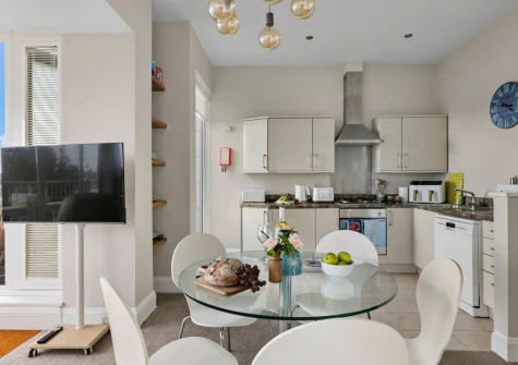 The kitchen & dining area at Beach View Suite at Astor House, Torquay