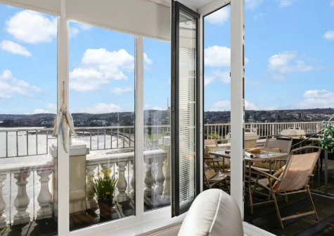 Step out onto the balcony, with alfresco dining area
