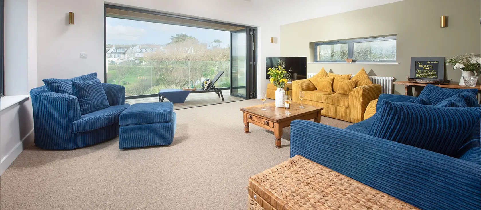 Beachside, Newquay is a stunning four-bedroom coastal retreat just 30 seconds from Porth Beach. Enjoy modern comforts, sea glimpses, spacious terrace, and access to Cornwall's finest beaches and attractions, perfect for unforgettable family holidays.