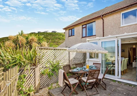 The patio & alfresco dining area at Beachside, Porthtowan