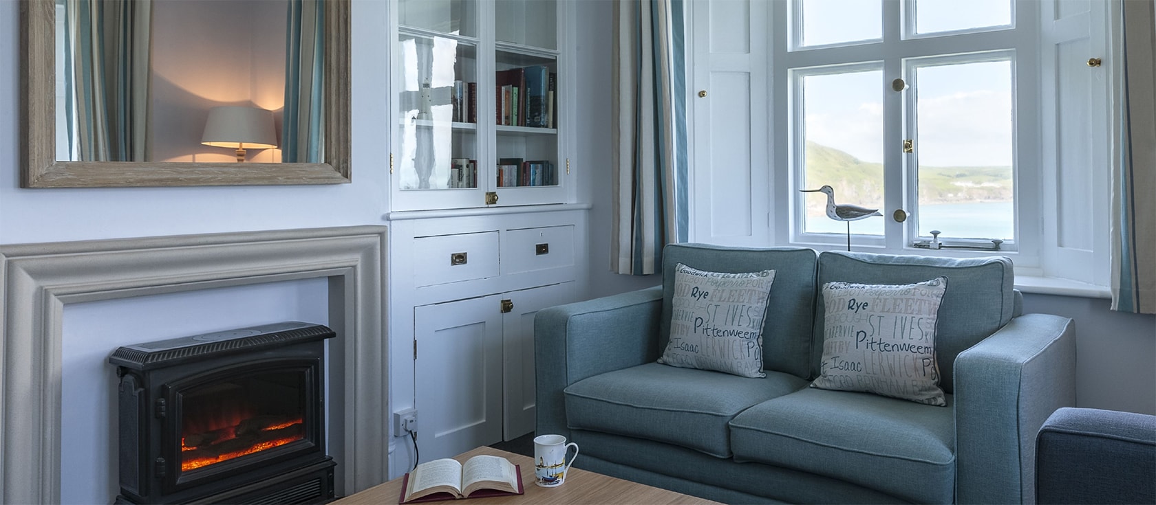 Beacon Cottage, Start Point Lighthouse is a three bedroom clifftop house within the lighthouse complex. Modern well-appointed rooms include three bedrooms & a cosy sitting room with fireplace. Clifftop deck, parking & stunning sea views.