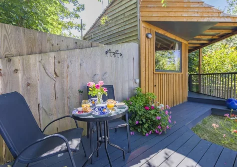 The decked patio & outdoor sitting area at Becks Meadow Lodge, Black Torrington