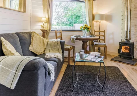Becks Meadow Lodge, Black Torrington is a beautifully presented romantic retreat for couples, complete with a private hot tub, wood burner, and stylish interiors, offering the perfect base for exploring Devon's stunning countryside and coastline.