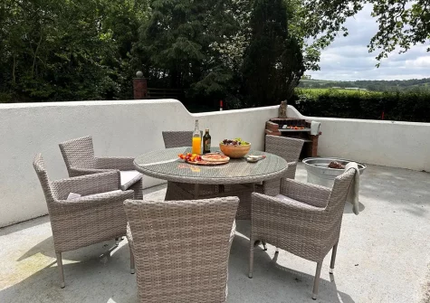 The patio, barbecue & alfresco dining area at Beechcroft, Clawton