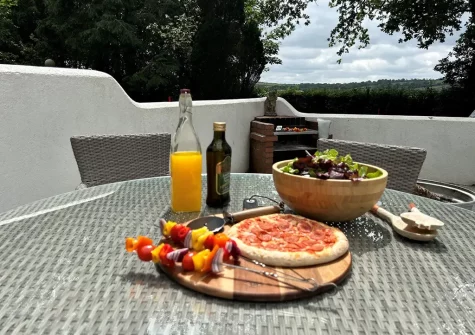 The patio, barbecue & alfresco dining area at Beechcroft, Clawton