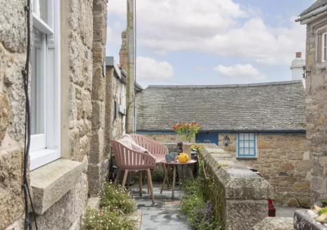 The charming front patio & outdoor sitting area at Berakah, Mousehole