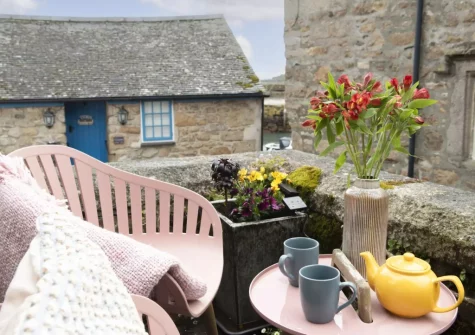 The charming front patio & outdoor sitting area at Berakah, Mousehole