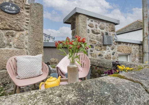 The charming front patio & outdoor sitting area at Berakah, Mousehole
