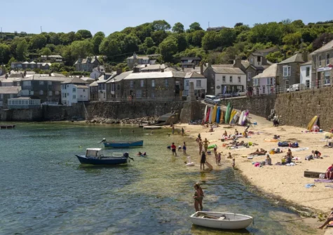 Mousehole Harbour's pretty low-tide beach is an idyllic place to soak up the sunshine & atmosphere
