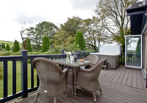 The wrap-around deck at Berrynarbor Lodge, Kentisbury Grange, Kentisbury