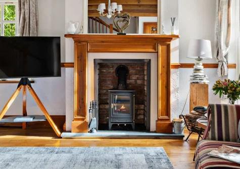 Beryas Cottage, Buryas Bridge is a characterful two-bedroom retreat wrapped in lush tropical greenery near Penzance, featuring a cosy woodburner, delightful courtyard garden with barbecue, and easy access to West Cornwall's finest beaches.
