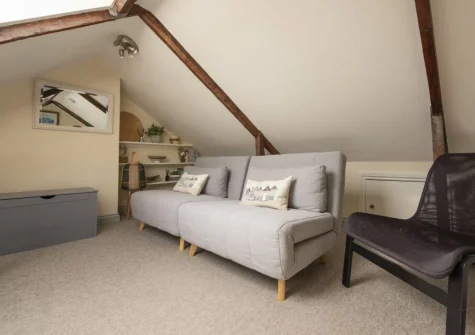 The mezzanine seating area at Bessie Ellen's Cottage, Fowey