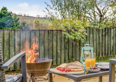 The patio & outdoor sitting area at Betty's Cottage, Bishop's Tawton