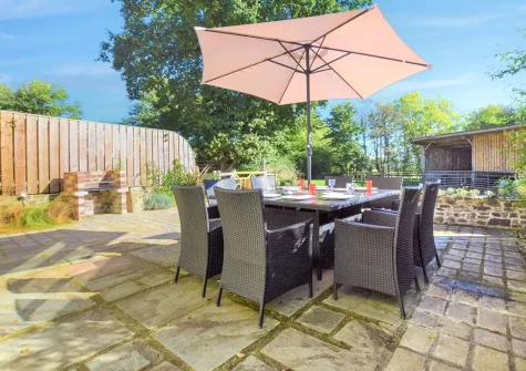 The patio, barbecue & alfresco dining area at Birds Nest, Bondleigh