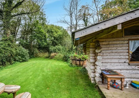The garden & children's playhouse at Birds Nest, Bondleigh