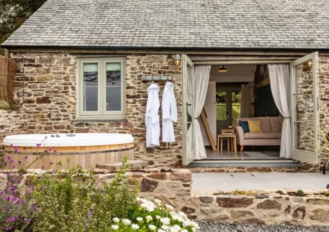 The patio & hot tub at Birdsong Barn, Combe Martin