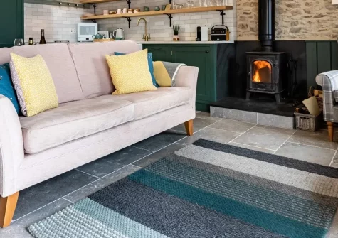 Birdsong Barn, Combe Martin is a charming barn conversion with rustic character, private hot tub, and stunning valley-to-sea views. Perfect for couples seeking a peaceful and relaxing countryside retreat with walks and easy beach access nearby.