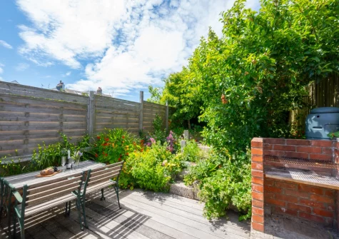The decked patio gaden, babecue & alfresco dining area at Black Rock, St Ives