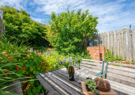 The decked patio gaden, babecue & alfresco dining area at Black Rock, St Ives