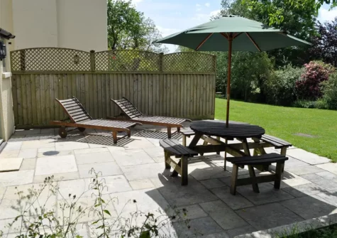 The patio & alfresco dining area at Bloomsbury Cottage, Axminster