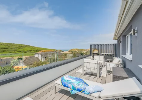 The decked balcony, barbecue & outdoor sitting area at decked balcony & outdoor sitting area