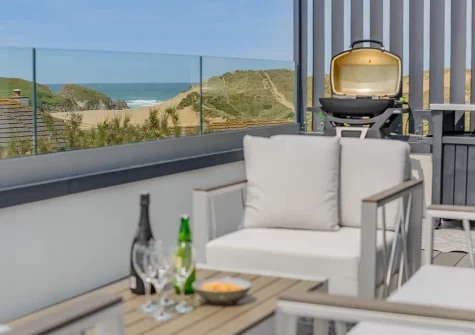 The decked balcony, barbecue & outdoor sitting area at decked balcony & outdoor sitting area