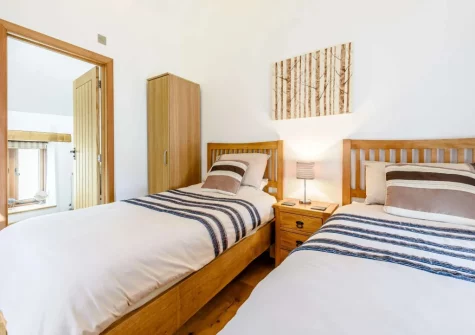 Bedroom #2 & en-suite shower room at Bluebell Barn, Alfardisworthy