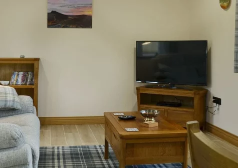 Bluebell Barn, Meldon is a stylish converted granite barn near Okehampton, featuring a private hot tub, enclosed garden with Dartmoor views, galleried bedroom with en-suite, and peaceful countryside setting perfect for exploring Devon and Cornwall.