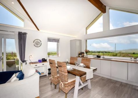 The dining area & kitchen at Bluebell Cottage, St Just