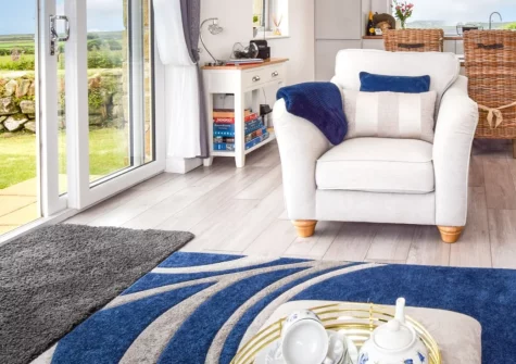 Bluebell Cottage, St Just is a stunning single-level barn conversion nestled on the wild Penwith peninsula. Enjoy a private hot tub, sweeping coastal views, and easy access to Land's End, Sennen Cove, and the magical open-air Minack Theatre.
