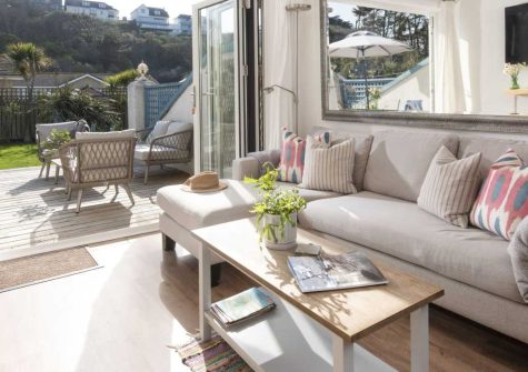 Bluebirds, Polzeath is a charming two-bedroom cottage just fifty metres from the beach, boasting a sunny south-facing garden, stylish open-plan living space, allocated parking, and easy access to surf, sand, caf&eacute;s and coastal walks nearby.
