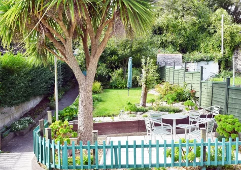 The patio, alfresco dining area & garden at Blythswood, Marazion