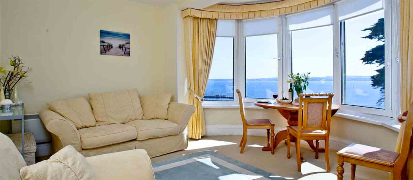 Boohay is a beautifully maintained, south facing apartment in Bay Fort Mansions. This lovely Victorian villa sits in an elevated position overlooking Torquay Marina, and Torre Abbey Sands, with stunning views along the English Riviera coastline.