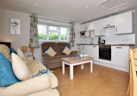 The living, dining area & kitchen at Borders Edge Lodge, Raymond's Hill
