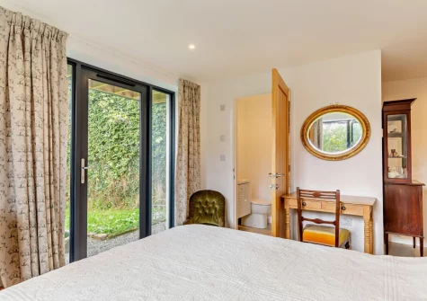 Bedroom #1 & en-suite shower room at Bowhousehay, Albaston