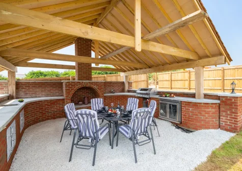 The outdoor kitchen, barbecue & alfresco dining area at Bowjy, Liskeard