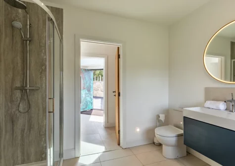The self-contained suite bathroom at Bracken Bank, Porthcurno